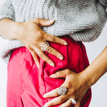 Load image into Gallery viewer, Woman wearing sterling silver architectural statement ring